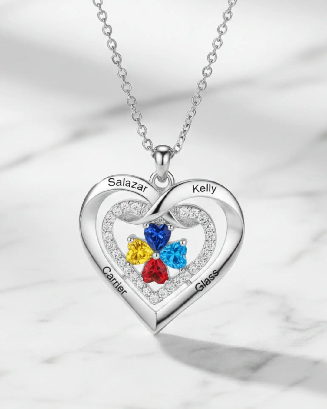 Collar de corazón con nombres grabados en el contorno y piedras de nacimiento en el centro, de 2 a 4 personas