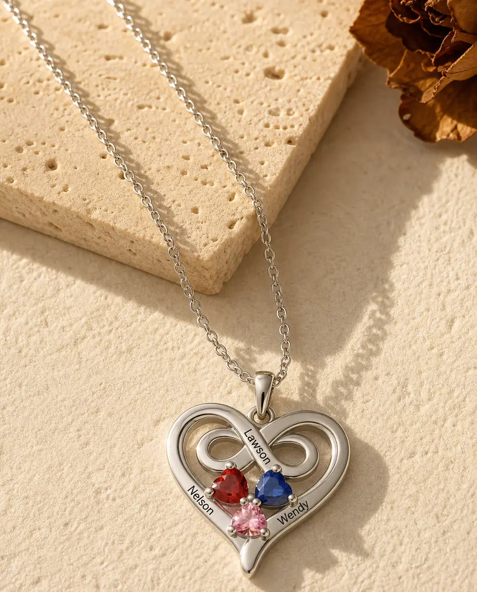 Collar de corazón con infinito - vista frontal en plata