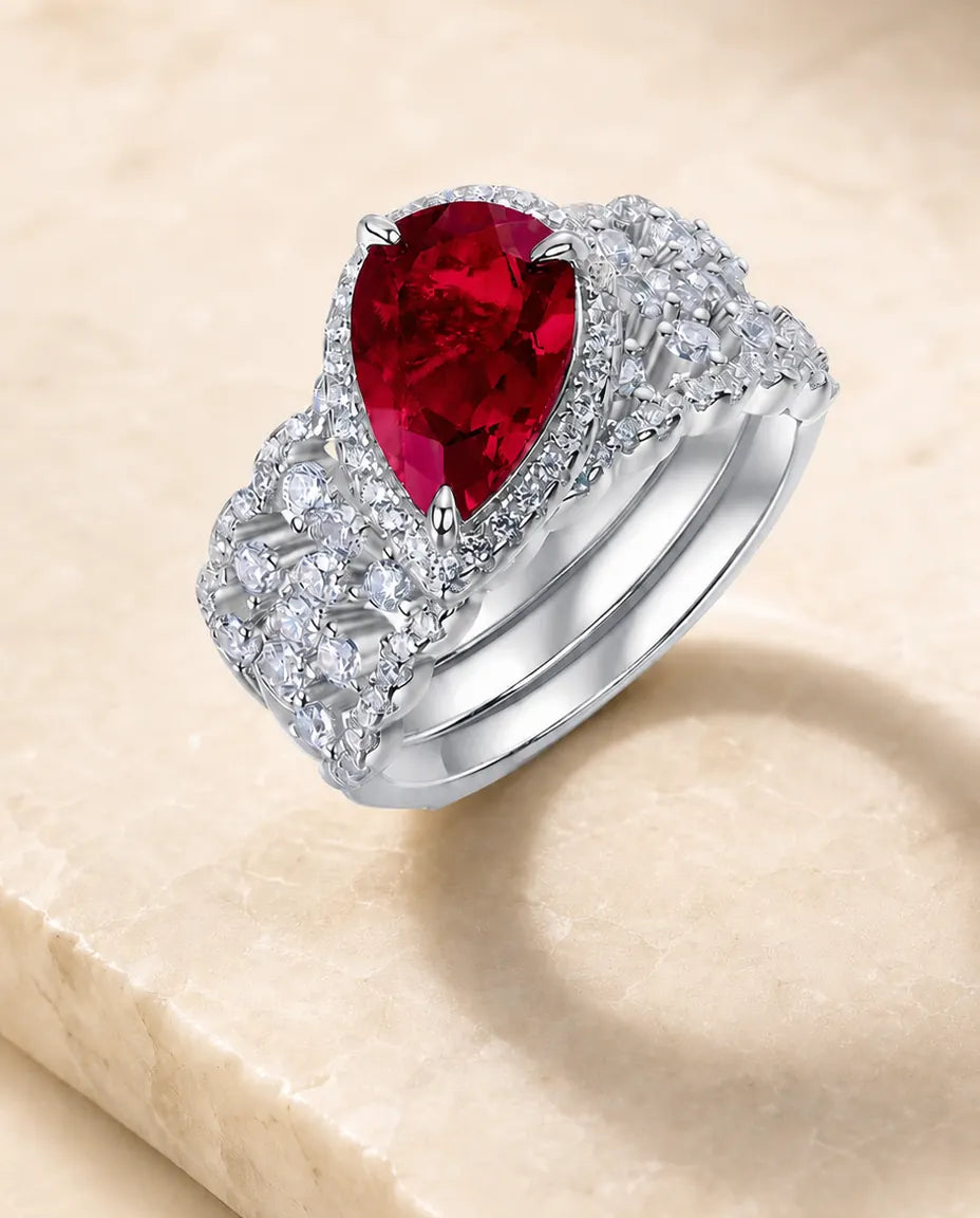 Conjunto de dos anillos de rubí – talla pera con halo y alianza curva en pavé, plata de ley 925, piedra de julio