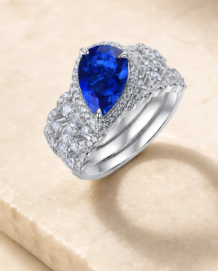 Conjunto de novia de dos anillos – zafiro creado en laboratorio talla pera con halo y alianza curva, plata de ley 925