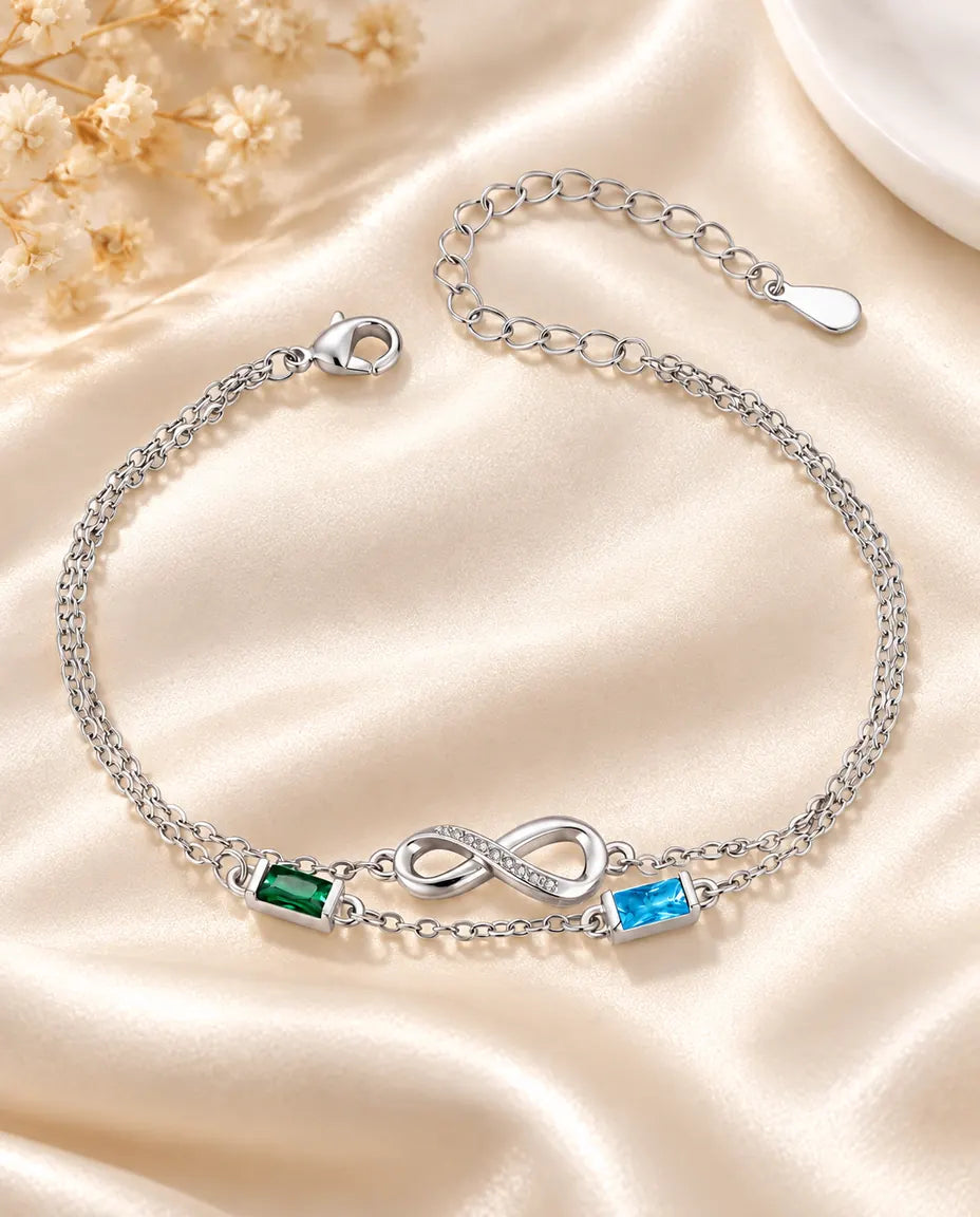 Pulsera infinito personalizada con dos piedras de nacimiento baguette en doble cadena