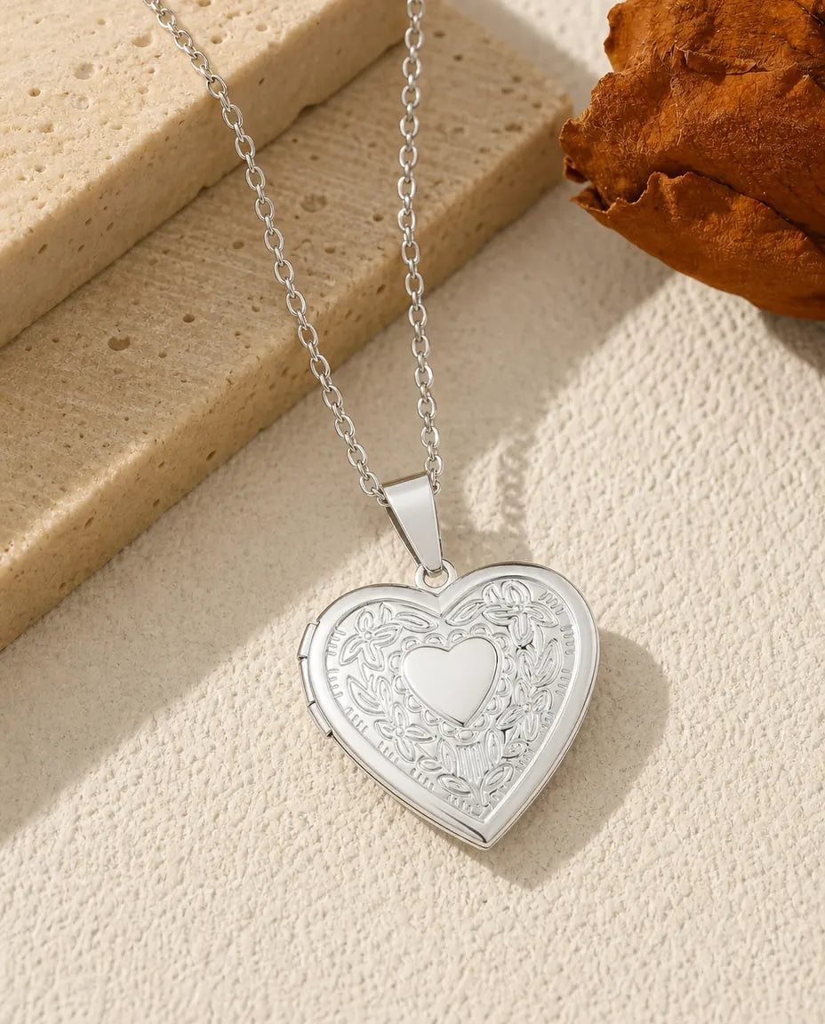 Relicario corazón con 2 fotos y grabado – relieve de flores en acero plateado o dorado, regalo de recuerdo