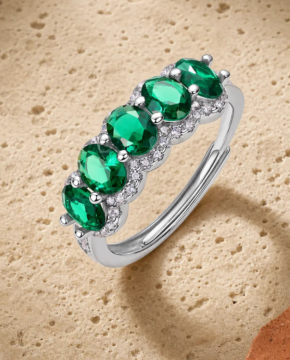 Anillo de esmeralda de cinco piedras – ovales creadas en laboratorio con halos graduados, plata 925