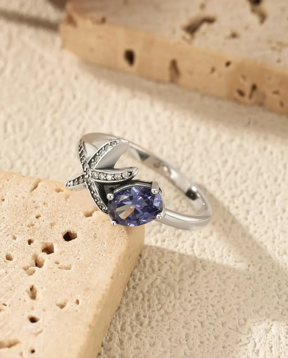 Anillo Estrella de Mar - circonita violeta ovalada de 5 x 7 mm y estrella en pavé, tallas 5 a 9, plata de ley 925