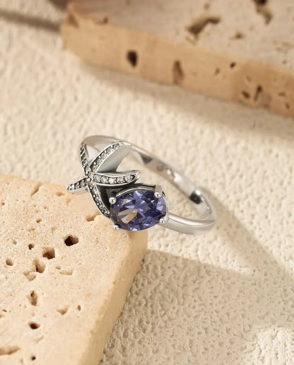 Anillo Estrella de Mar - circonita violeta ovalada de 5 x 7 mm y estrella en pavé, tallas 5 a 9, plata de ley 925
