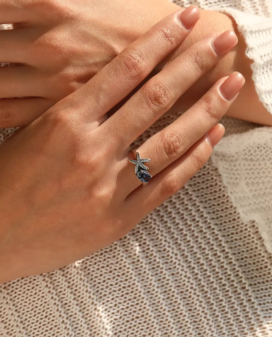 Anillo Estrella de Mar - circonita violeta ovalada de 5 x 7 mm y estrella en pavé, tallas 5 a 9, plata de ley 925