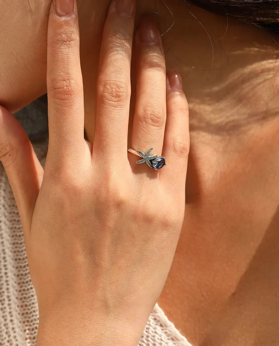 Anillo Estrella de Mar - circonita violeta ovalada de 5 x 7 mm y estrella en pavé, tallas 5 a 9, plata de ley 925