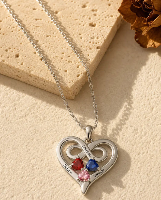 Collar de corazón con infinito - vista frontal en plata