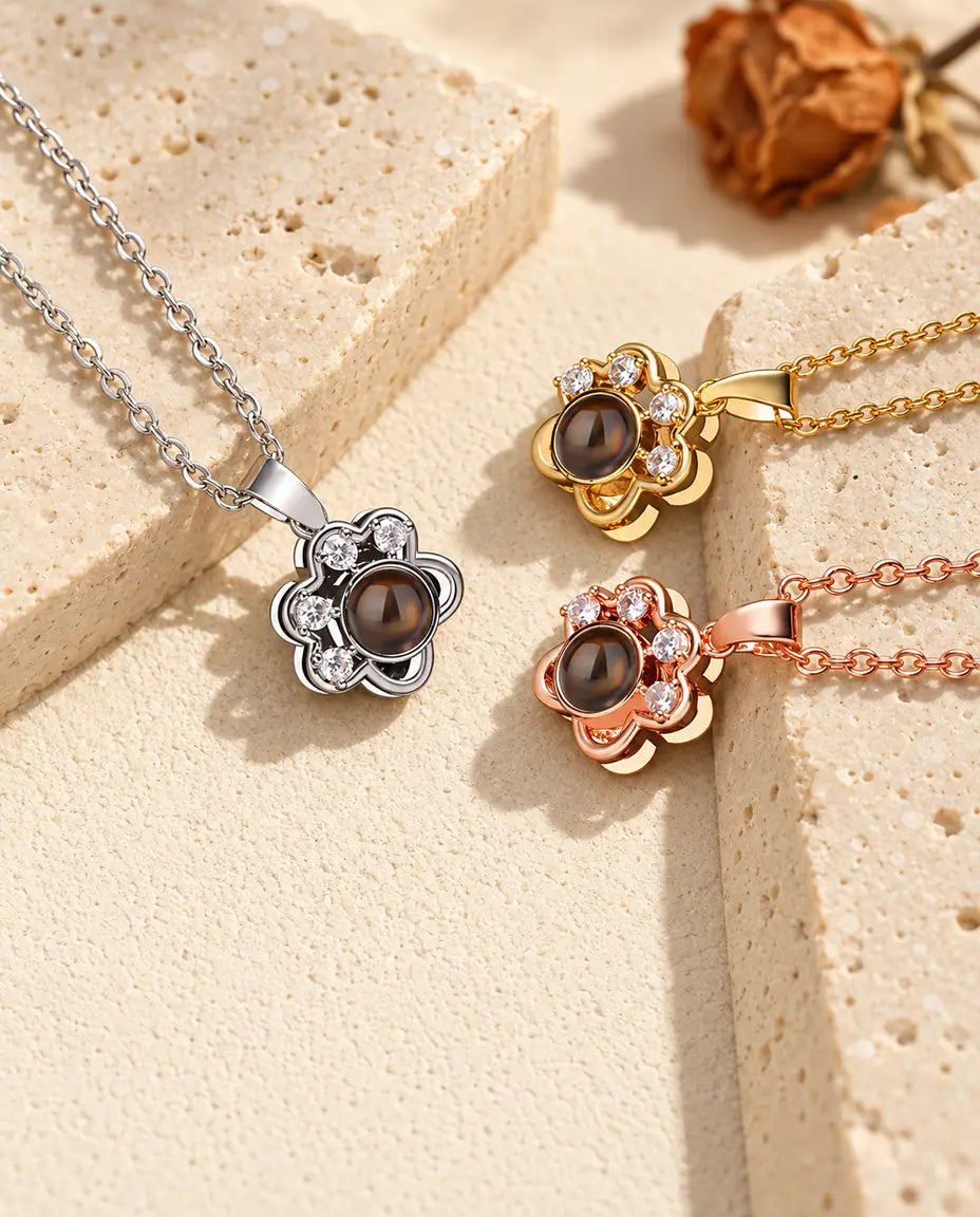 Colgantes de huella plateado, dorado y color oro rosa con dedos de circonitas
