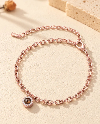 Pulsera con foto dentro color oro rosa, con colgante de circonitas, cierre de mosquetón y extensión