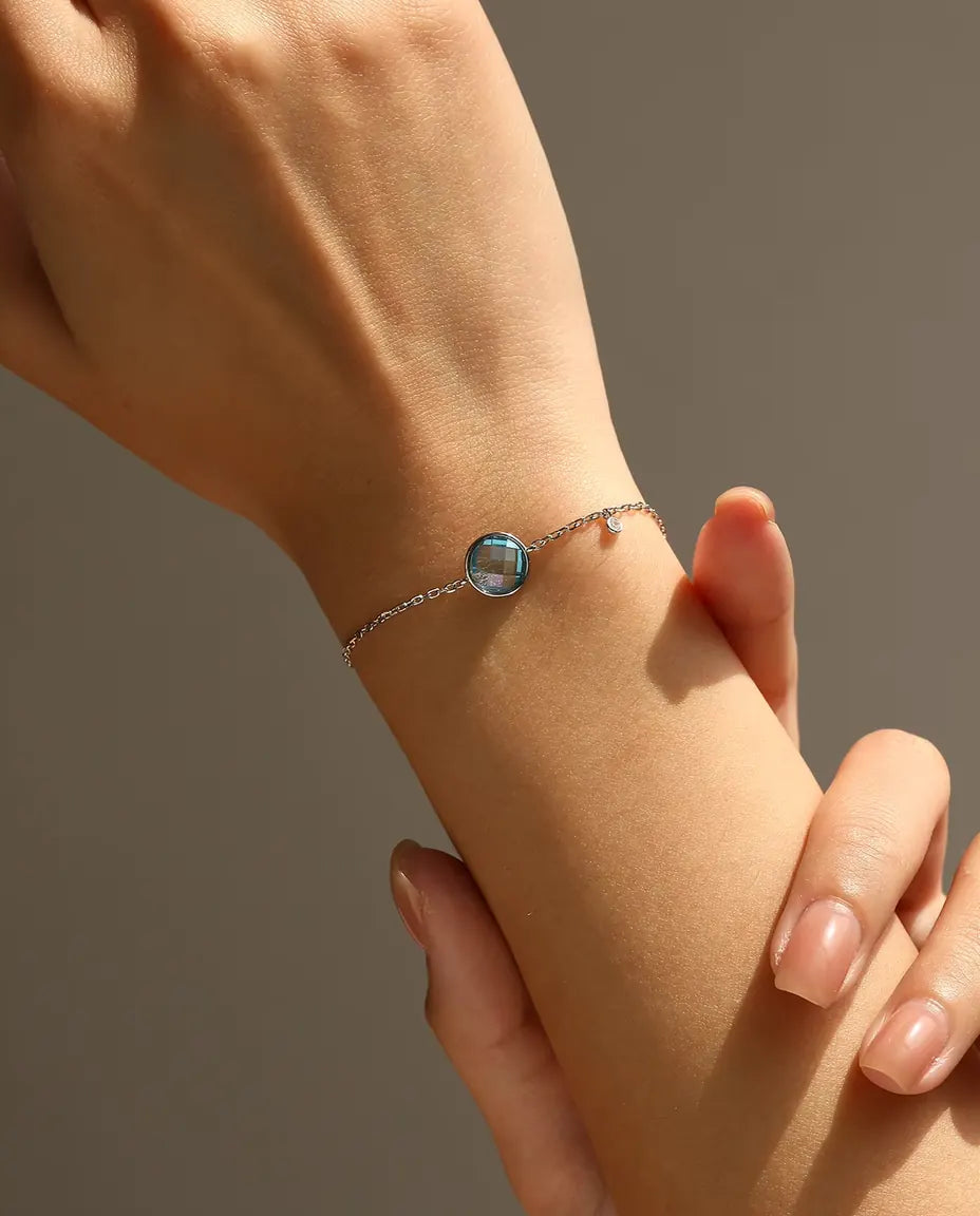 Pulsera con Circonita Azul - talla damero de 8 mm en cadena forzada con cierre corredizo, plata de ley 925