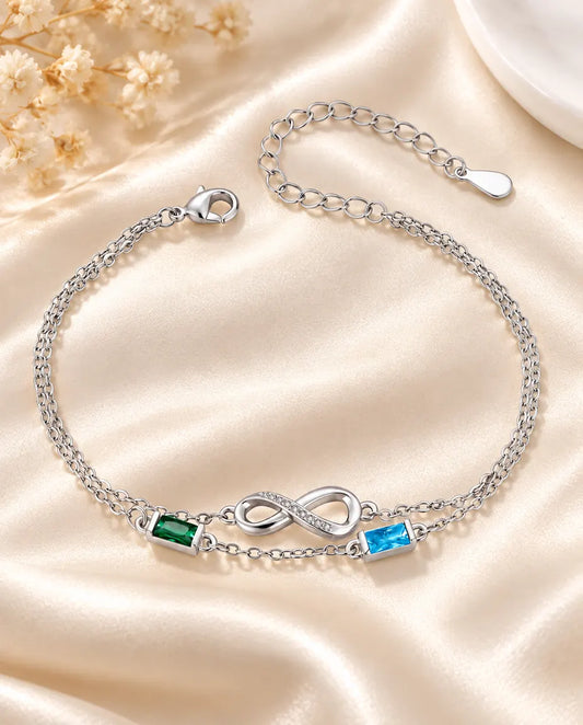Pulsera infinito personalizada con dos piedras de nacimiento baguette en doble cadena