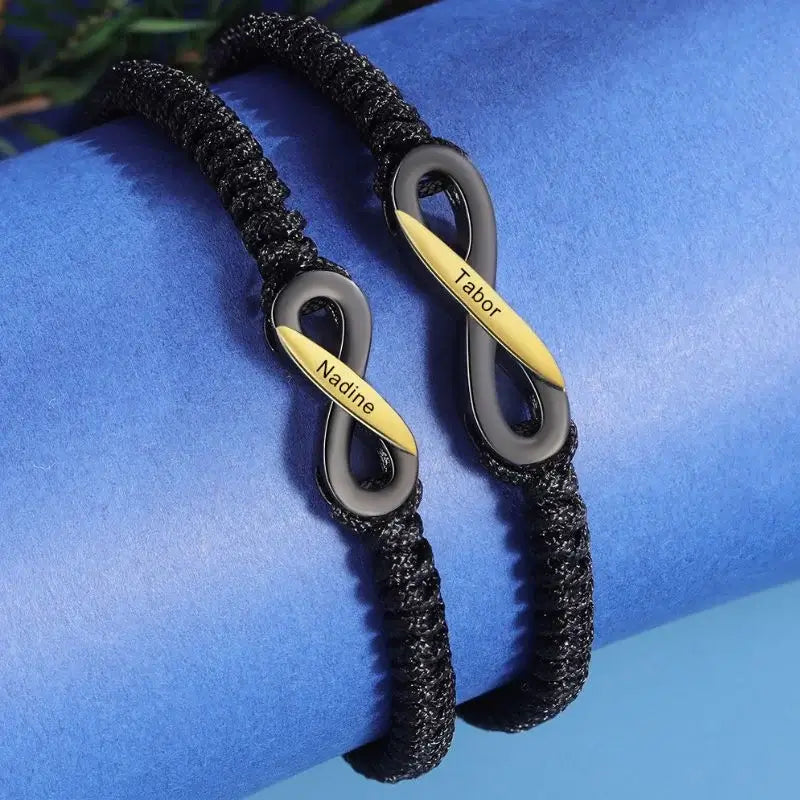 Pulseras de pareja con nombre – motivo infinito en negro, ajustables, set de 2 para ella y él