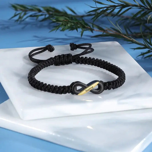 Pulseras de pareja con nombre – motivo infinito en negro, ajustables, set de 2 para ella y él
